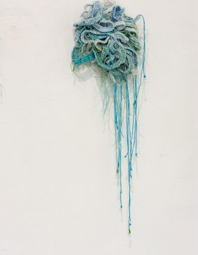 Entangled - green.14cm x 14cm x 36cm. Woven tapestry